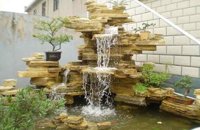 千层石假山跌水现场效果图